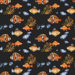 Seamless pattern with watercolor clown fishes and other oceanic fishes at the bottom of the ocean, hand painted on a dark background